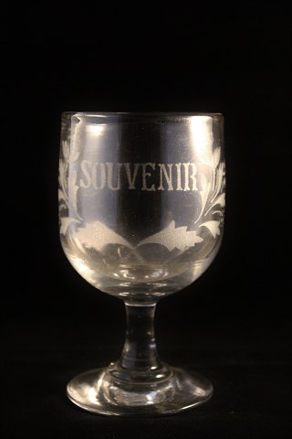 Old French souvenir wine glass with engraved writing and decorations. 
"Souvenir"