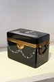 Antique 1800 Century "candy shrine" in black glass with painted decorations.