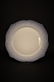 10 pcs. Royal Copenhagen dinner plates in fish dinnerware, plate dia.:24cm. RC# 
1212/3002. 2.sort.
From between 1870-1923.