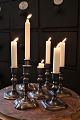 Old tin candlesticks with slightly different height and design...