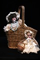 2 fine old dolls with porcelain heads, real hair and fine lace fabric dresses...