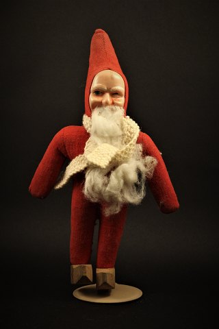 Old Santa Claus from the 50s in fabric with face in celluloid. 
Height: 29cm.