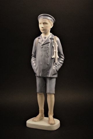 Sjælden porcelæns figur fra Bing & Grøndahl ( år 1915 ) af dreng med skøjter. 
H:29,5cm...