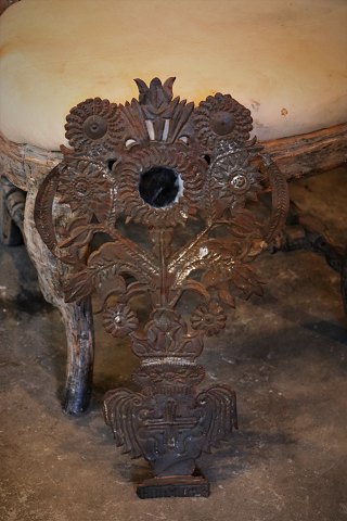 Decorative, old French metal wall decoration with floral motif and small mirror. 
H:53,5cm. W:31cm.
