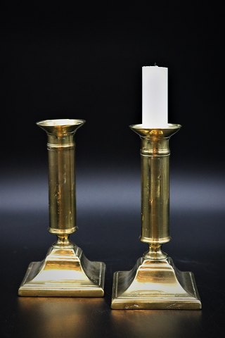 A pair of antique brass candlesticks, Height: 16cm.