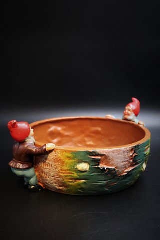 Old German painted terracotta bowl from the 50s with 2 gnomes on the edge of the 
bowl. 
H:11cm. Dia:28cm.