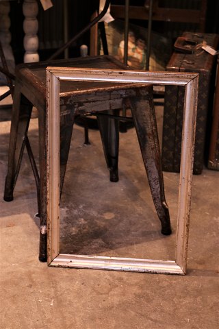 Antique French 1800s wooden frame with original old silver coating 
and a really nice patina. 
Outer dimensions: 52x36cm.