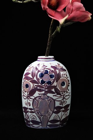 Aluminia Fajance Tenera vase with floral motif in purple colors. 
Designed and signed by Cari Kristensen. 
181/2878.
