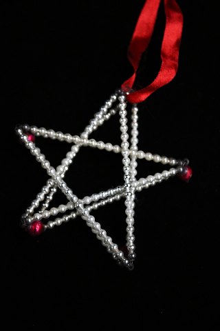 Old Christmas tree decoration in the form of a Christmas star made of small 
glass balls from around 1930...