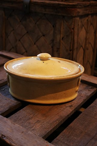 Old French oval pâté form with lid in cream colored earthenware...