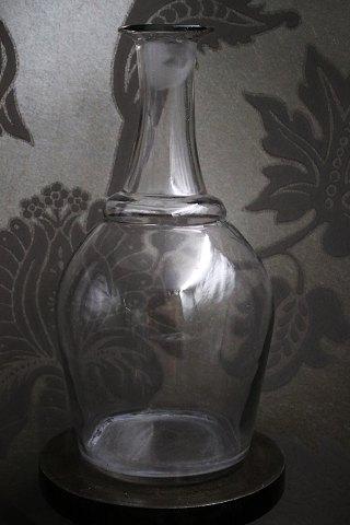 Old French wine decanter in glass...