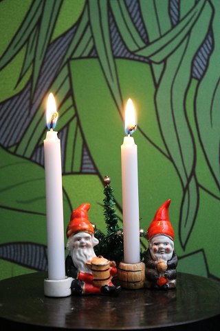 Old Christmas elves in porcelain with a holder for a small Christmas candle...