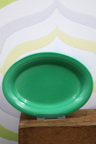 Ursula fad i fajance fra Royal Copenhagen designet af Ursula Munch-Petersen i grøn glasur. 18x13cm...