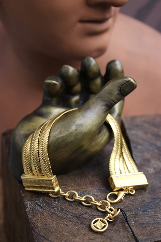 Vintage Givenchy armbånd i guldfarvet metal fra 80érne...