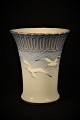 Bing & Grondahl, B&G vase in the seagull with gold decorations. No. 683.
H: 16cm. Dia.:13cm.
