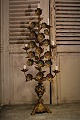 Antik Fransk kirkelysestage i forgyldt bronze med plads til 7 stearinlys...H:92cm. B:35cm.