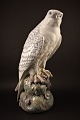 Stor Royal Copenhagen porcelæns figur af Islandsk falk.
H:39,5cm.
RC# 1661.