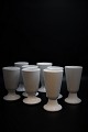 Gamle franske kaffe krus på fod i kraftig hvid porcelæn.Højde: 14 - 14,5cm. Dia:7,5cm.
