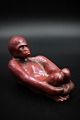 Lille keramik skål fra Hjorth i i form af orangutang i rød/brun glasur.H:9cm. L:16cm.