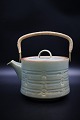 Jens Harald Quistgaard - Rune Nissen / Bing & Grondahl stoneware.
Teapot with wicker handle...