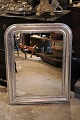 Fransk 1800 tals Louis Philippe sølv kamin spejl med fin dekoreret ramme og originalt gammelt spejlglas og fin patina.H:93cm. B:71cm.SOLGT !