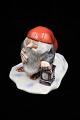 Royal Copenhagen Christmas porcelain figure of Santa Claus Design by Harald Wiberg. H: 9cm. / 12,5x9cm.RC# 369. 1.sort.