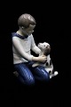 Bing & Grøndahl porcelænsfigur af dreng med lille hund.B&G 2334...