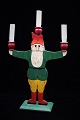 Old Swedish Santa Claus candlestick in carved wood from the 50s, painted with a 
fine patina.
H:38cm.
