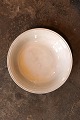 Old Swedish cream colored earthenware bowl with pearl edge from Gustavsberg with 
a fine patina...