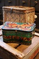 Decorative, old painted metal box with butterfly motif...