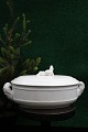 Old Swedish oval Christmas terrine in white porcelain with a lying elf on the 
lid...