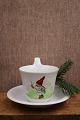 Høj-hanks kop med julemotiv og guldkant fra Bing & Grøndahl...