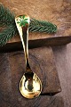 Års juleske fra Georg Jensen (1975)i forgyldt sterlingsølv med emalje blomst.