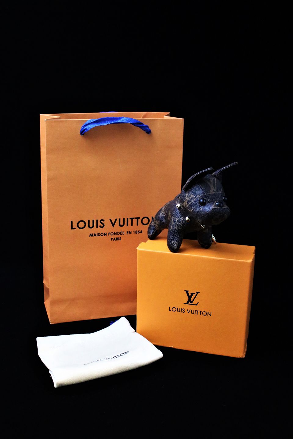 Louis Vuitton 2000s Silver and Black Key Chain · INTO